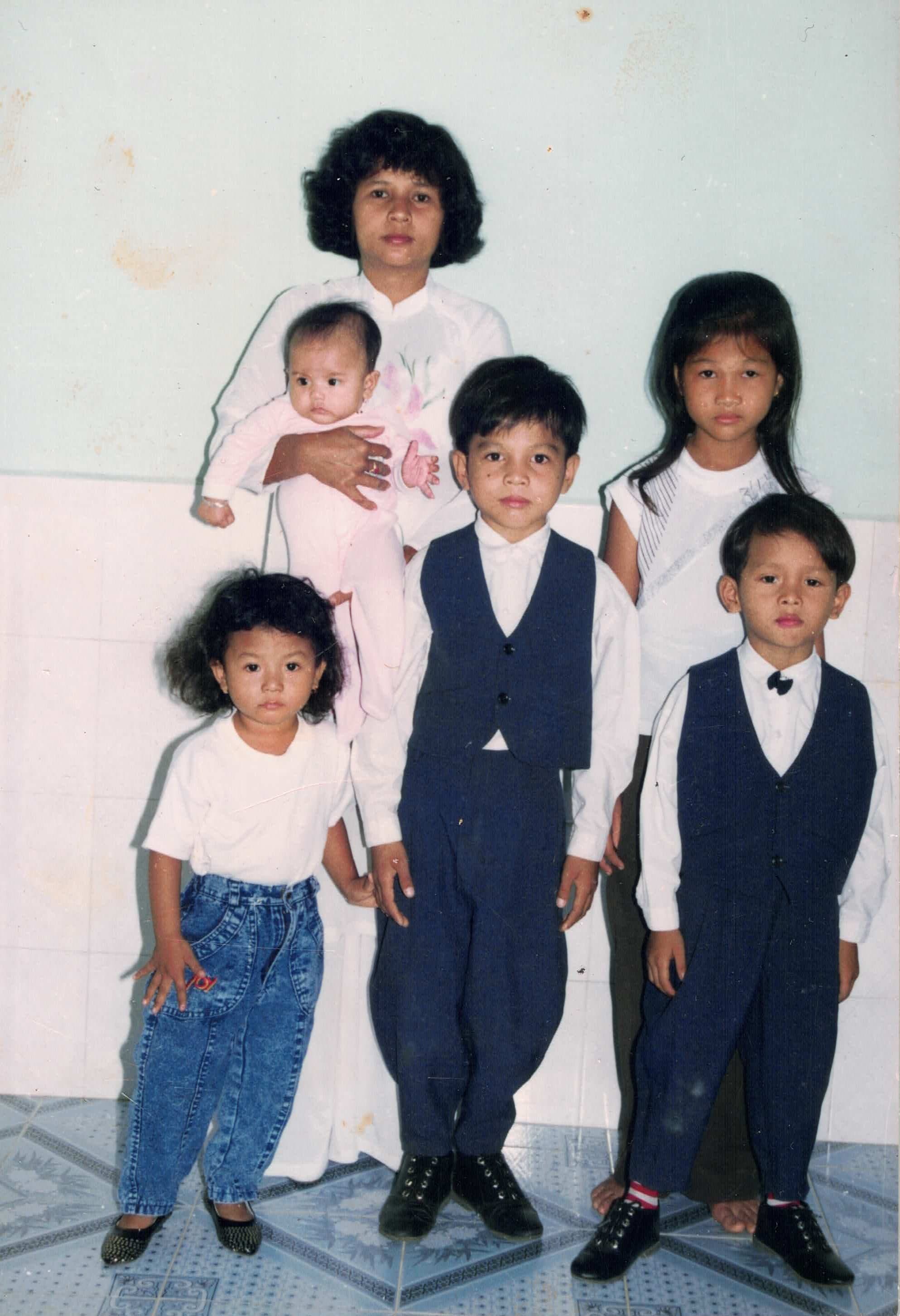 May Thach with family